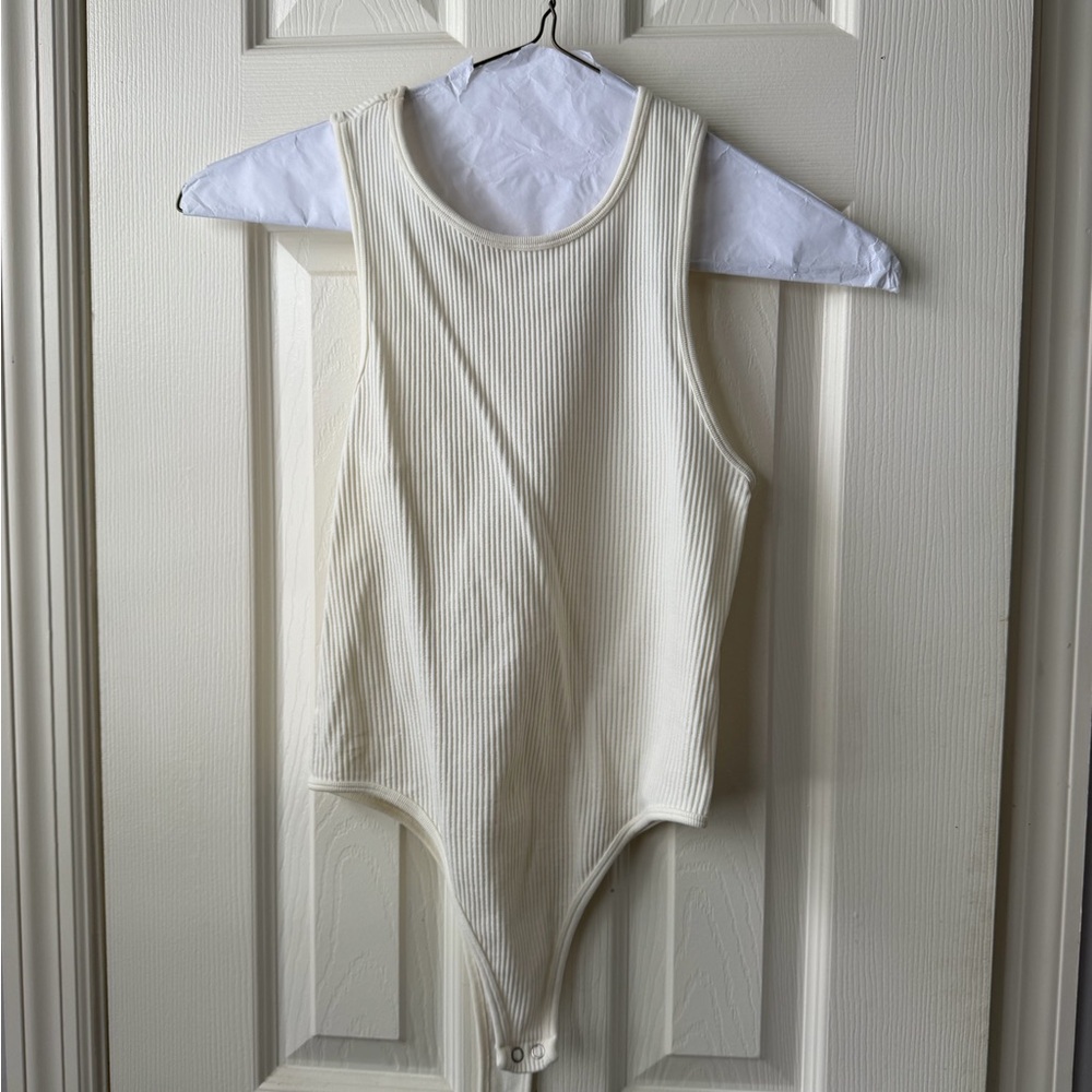 Cream Ribbed One Piece body suit